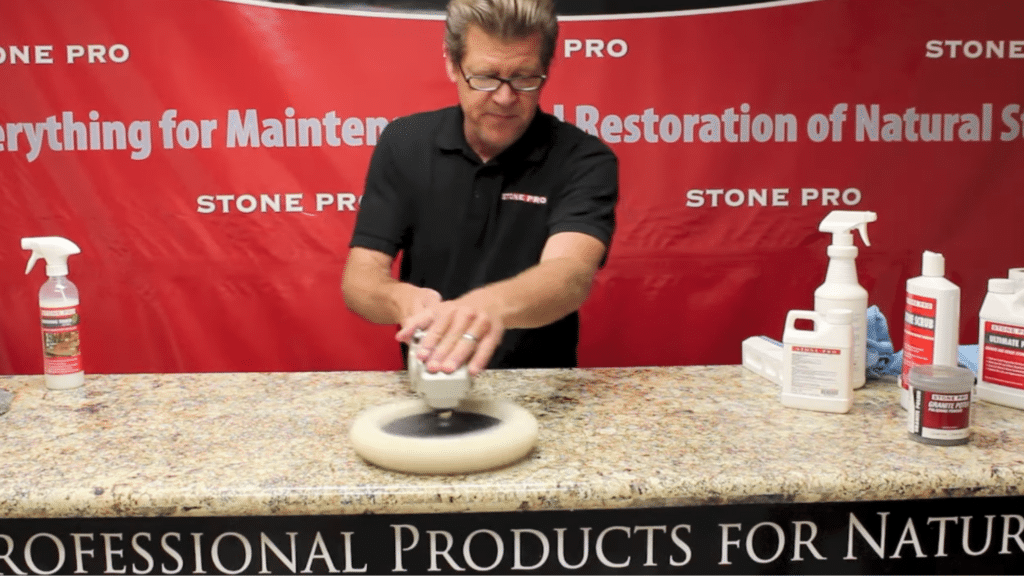 final buffing step in how to polish granite countertops using a soft pad to enhance shine and create a smooth finish