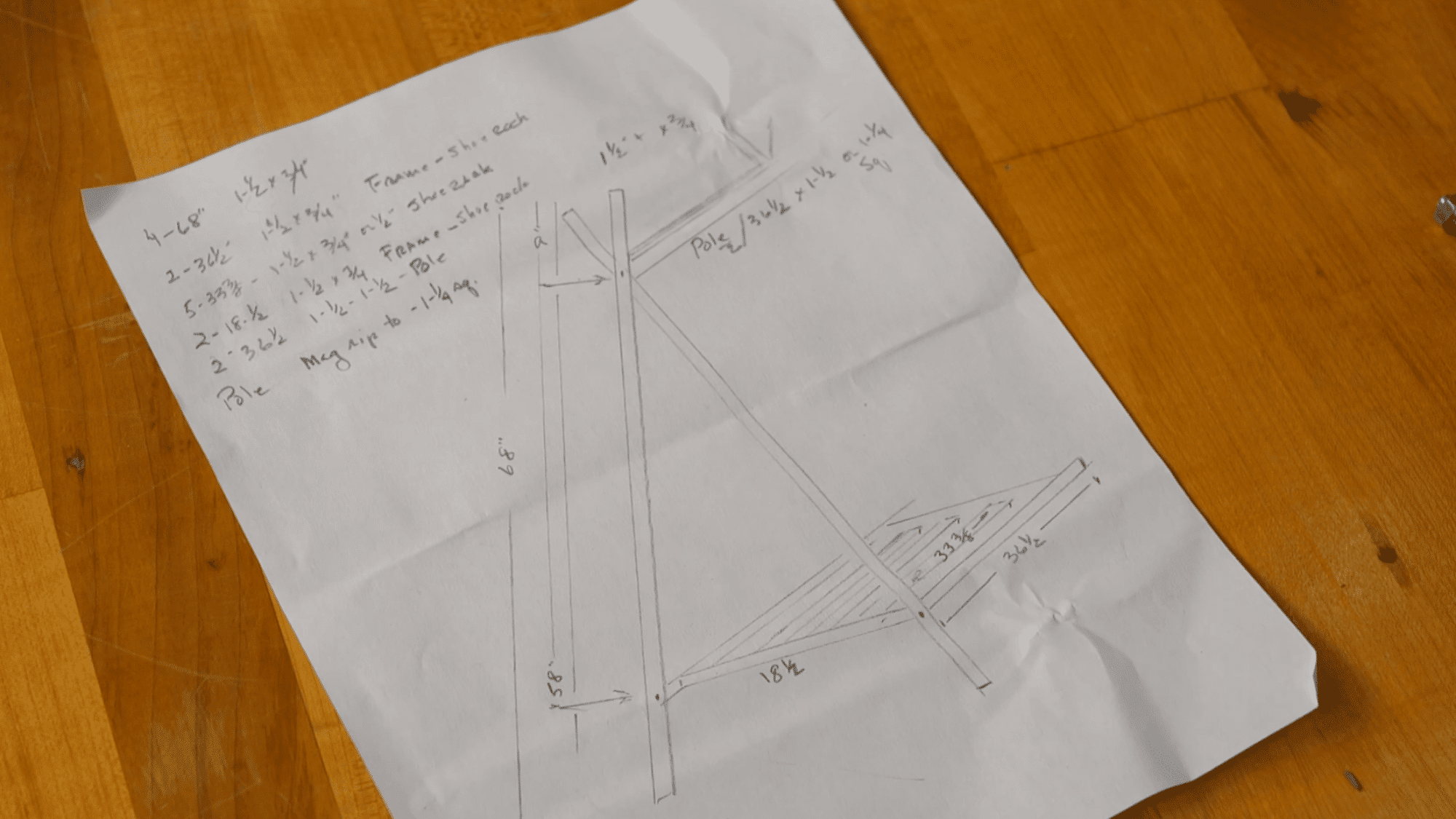 hand drawn cut list and measurements for diy clothes rack showing sizes layout and parts planning on paper