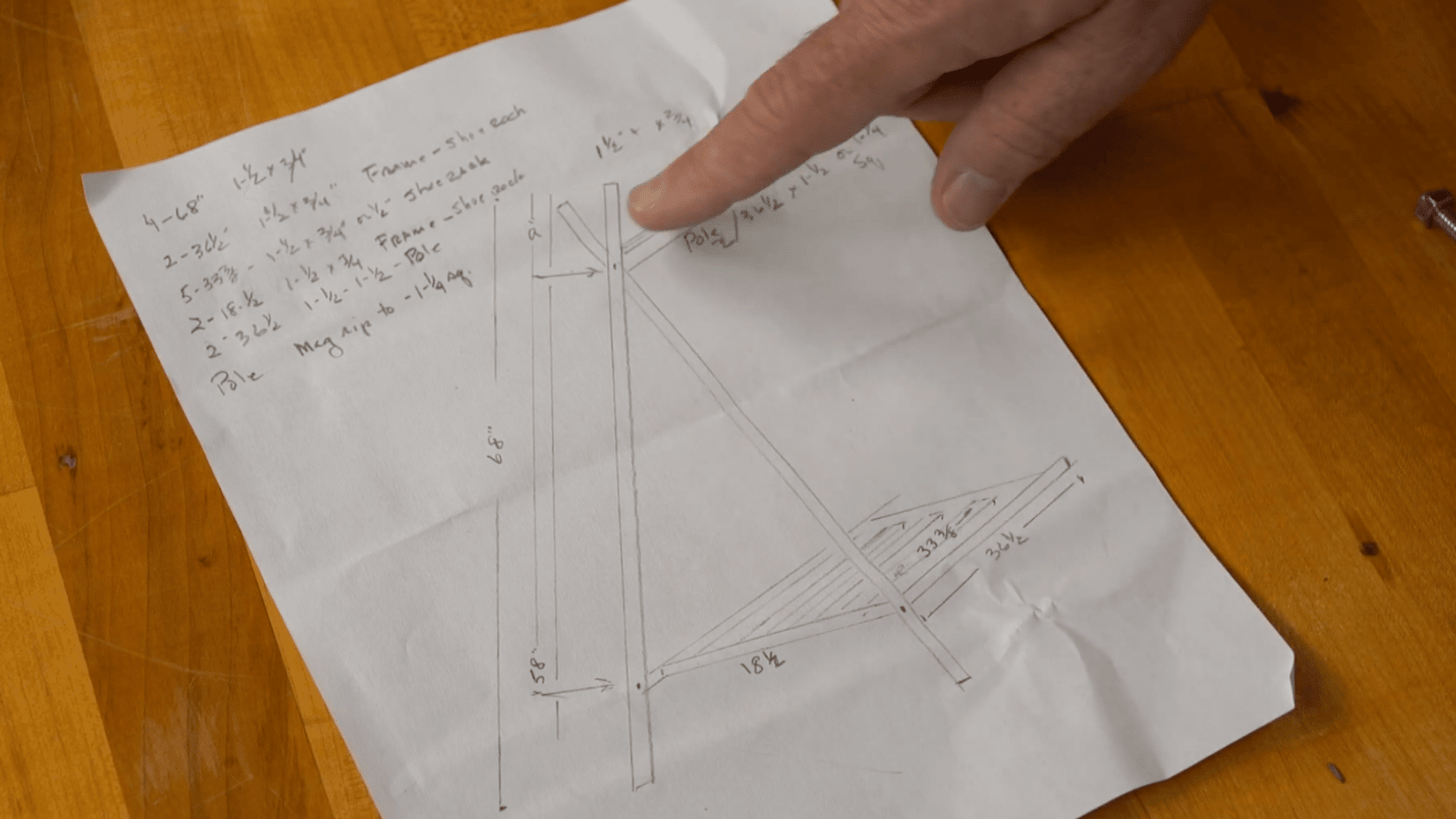 hand drawn design plan for diy clothes rack showing measurements layout and structure for building project