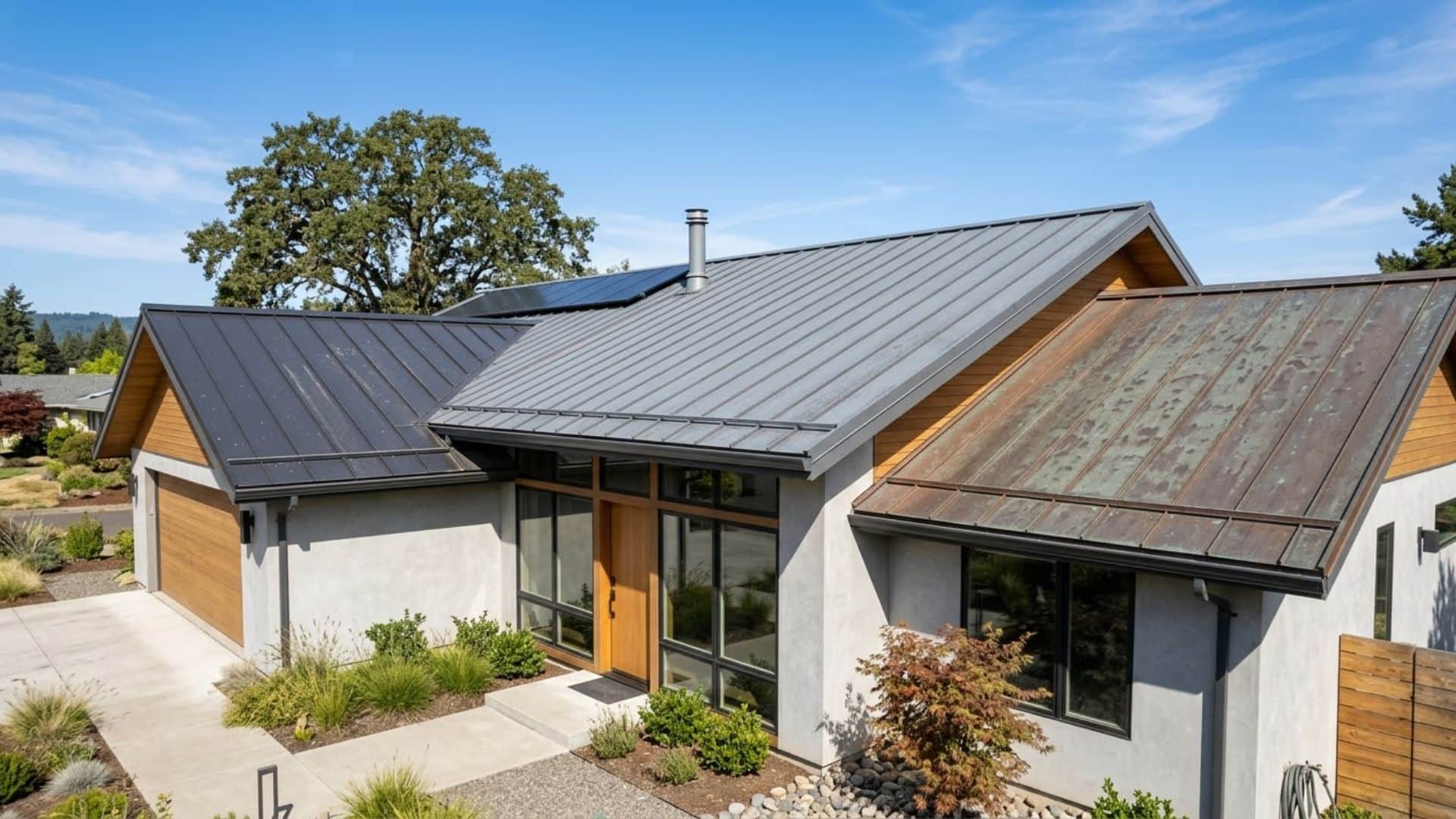 metal roof panels on modern house exterior showing steel aluminum copper and zinc roofing materials durable home roof design