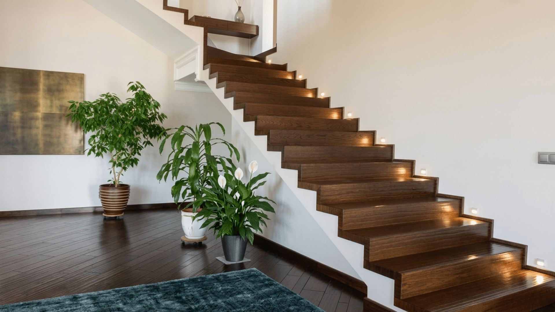 modern wooden flight of stairs with indoor plants and lighting
