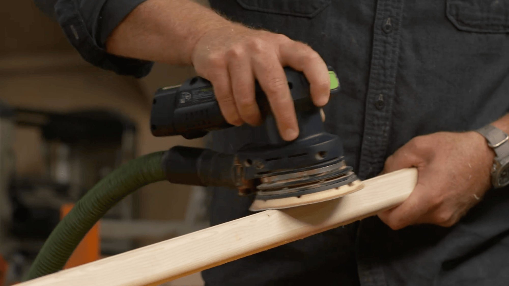 sanding wooden pole for diy clothes rack to smooth surface and edges for safe use and clean finish