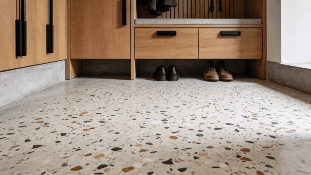terrazzo floor with built in wooden cabinets and shoes creating modern durable mudroom flooring design
