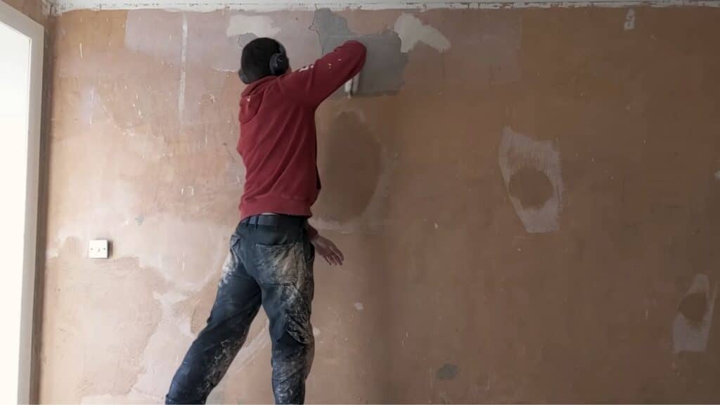 wall surface cleaning and bonding agent application before plastering for strong adhesion and smooth base