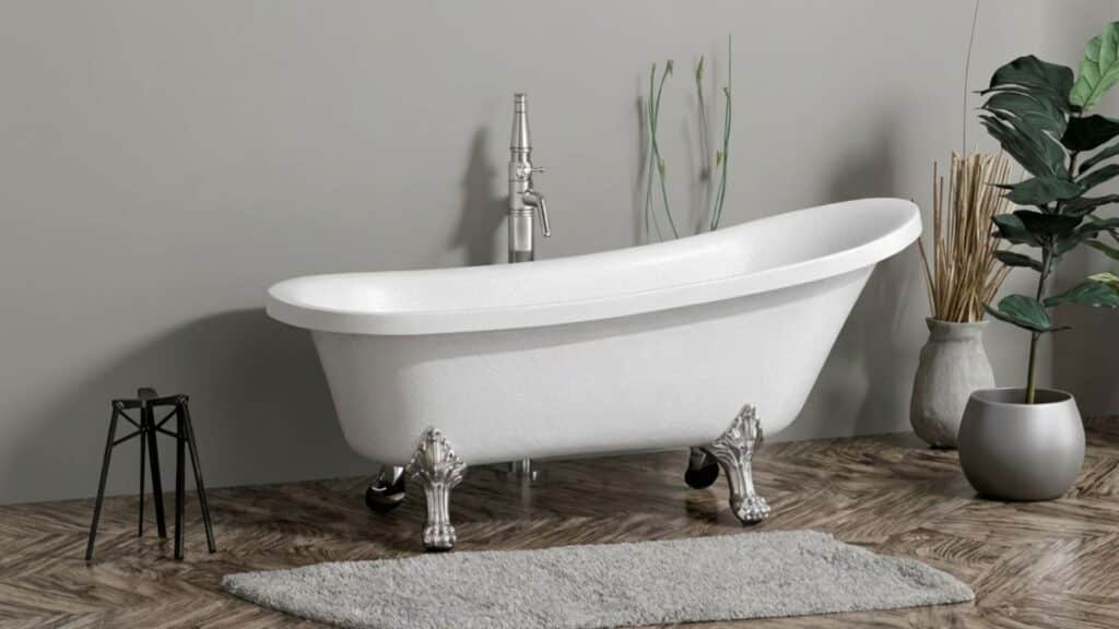 white clawfoot bathtub on wooden floor with metal faucet beside plants rug and minimal decor in calm neutral bathroom