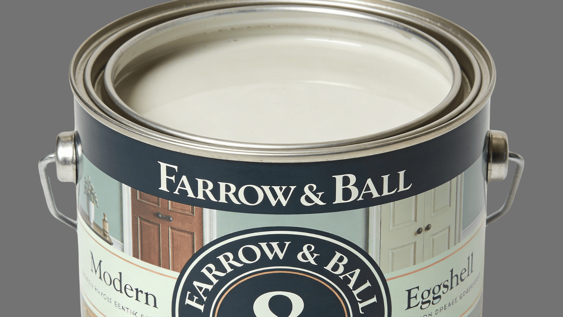 a farrow and ball eggshell modern paint can with lid removed showing white paint inside on white background