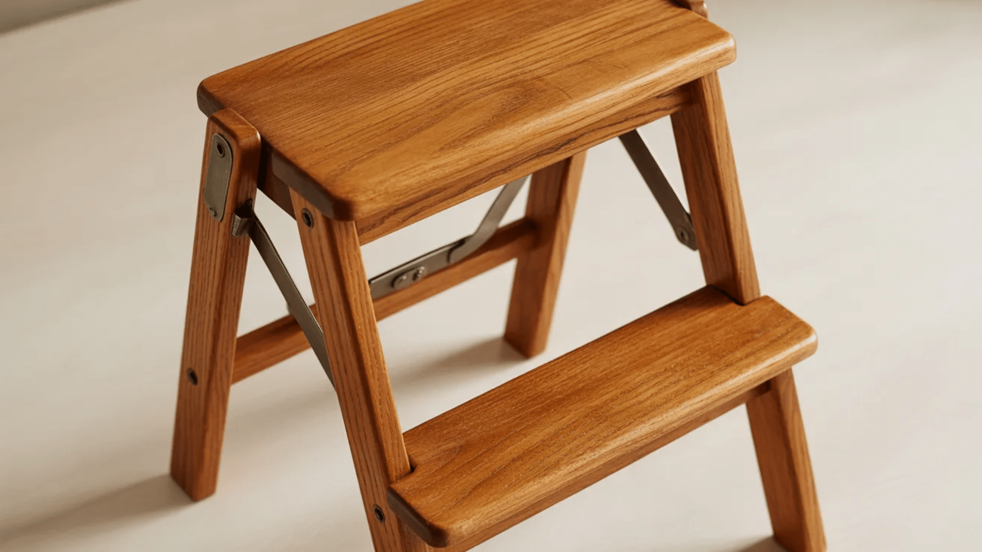 a folding step stool is a practical and space-saving wood project that adds both function and style