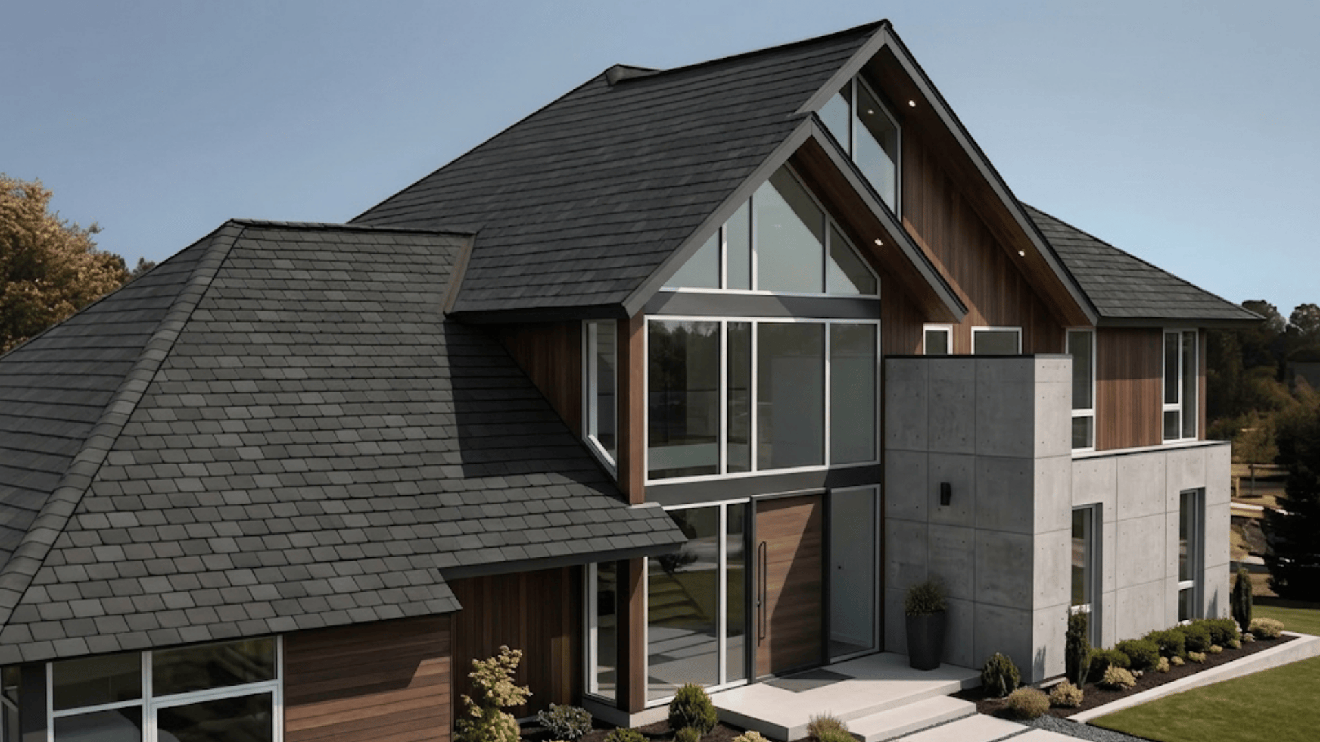 a house with a steeply pitched roof covered in dark slate shingles providing a classic look.