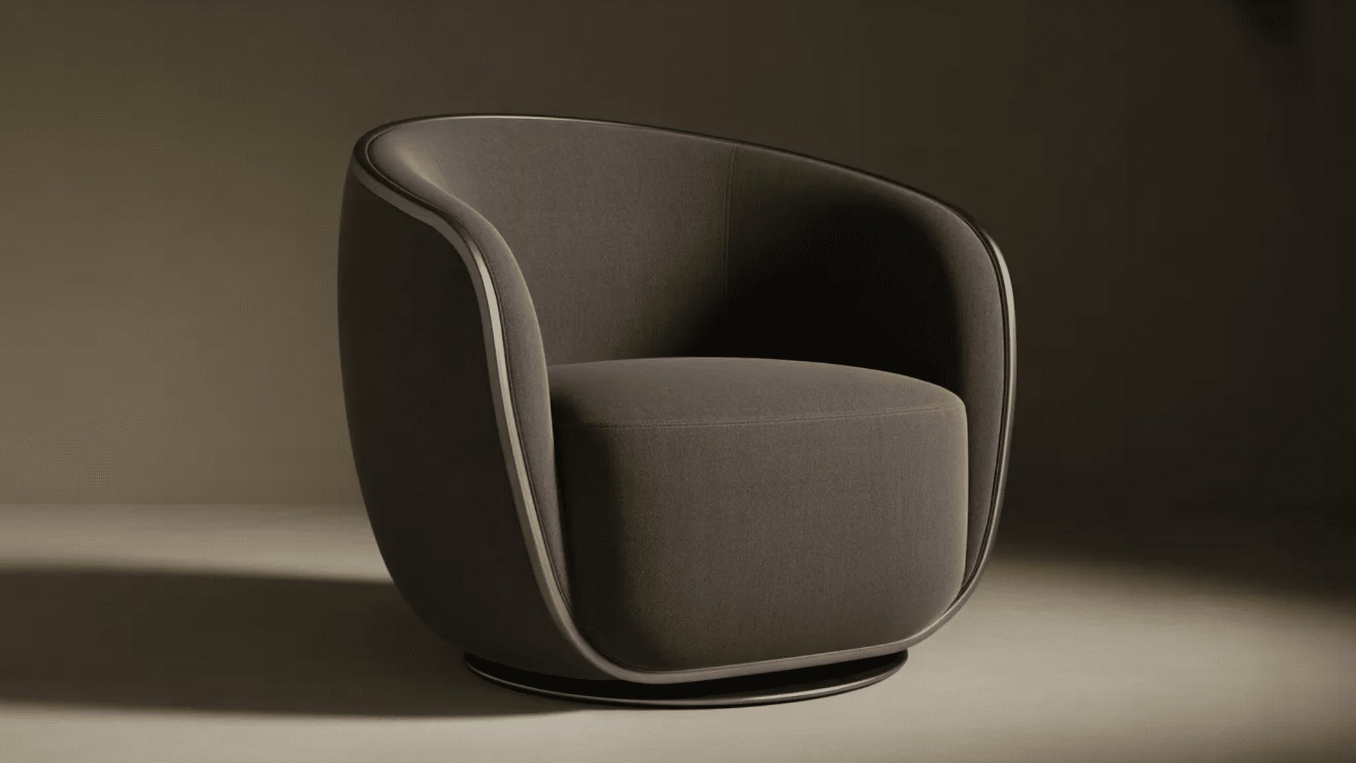 barrel chair with curved rounded back that wraps around the seat creating cozy supportive seating