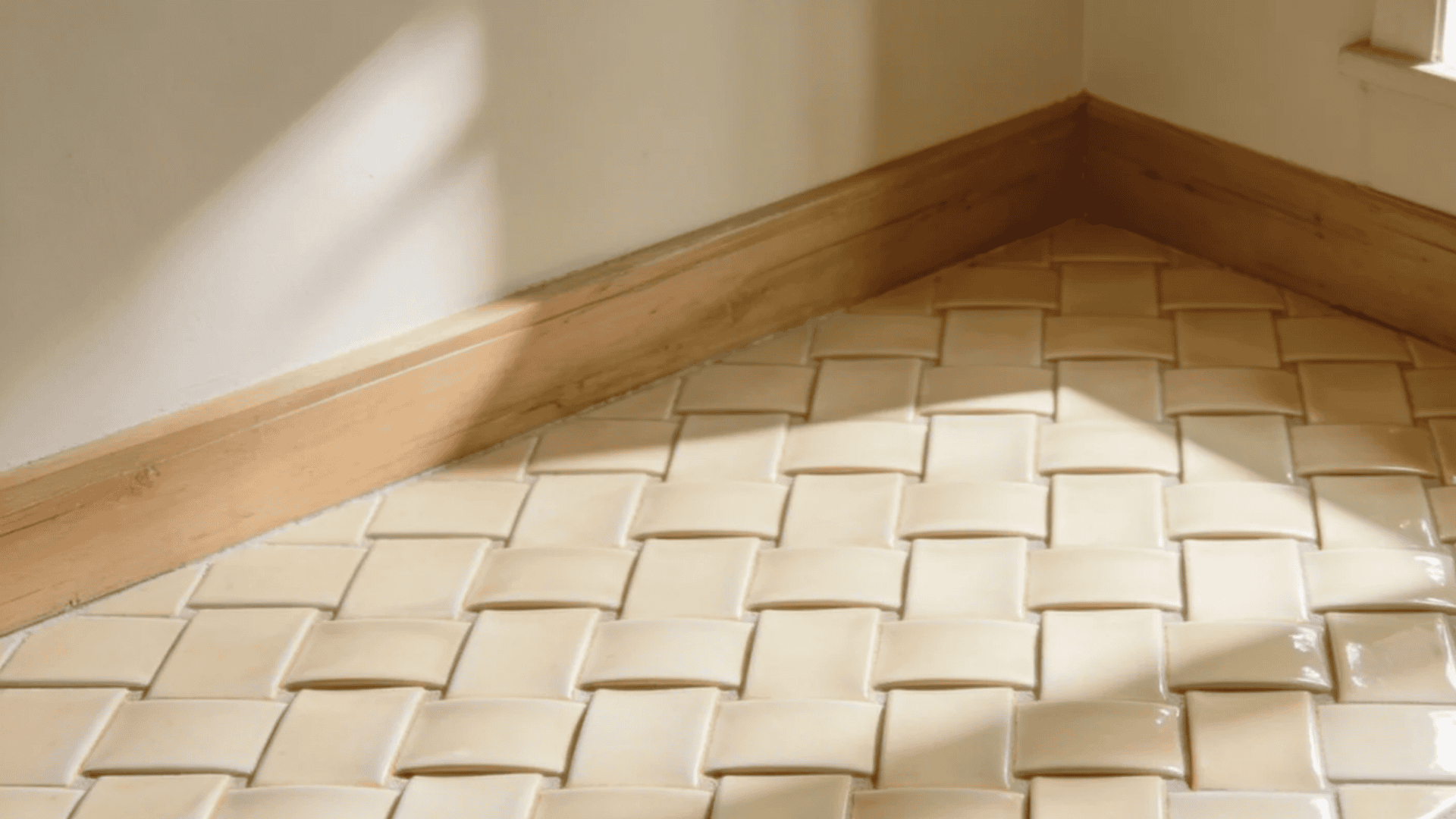 basketweave tile pattern with rectangular tiles arranged to look like woven strips adding soft texture