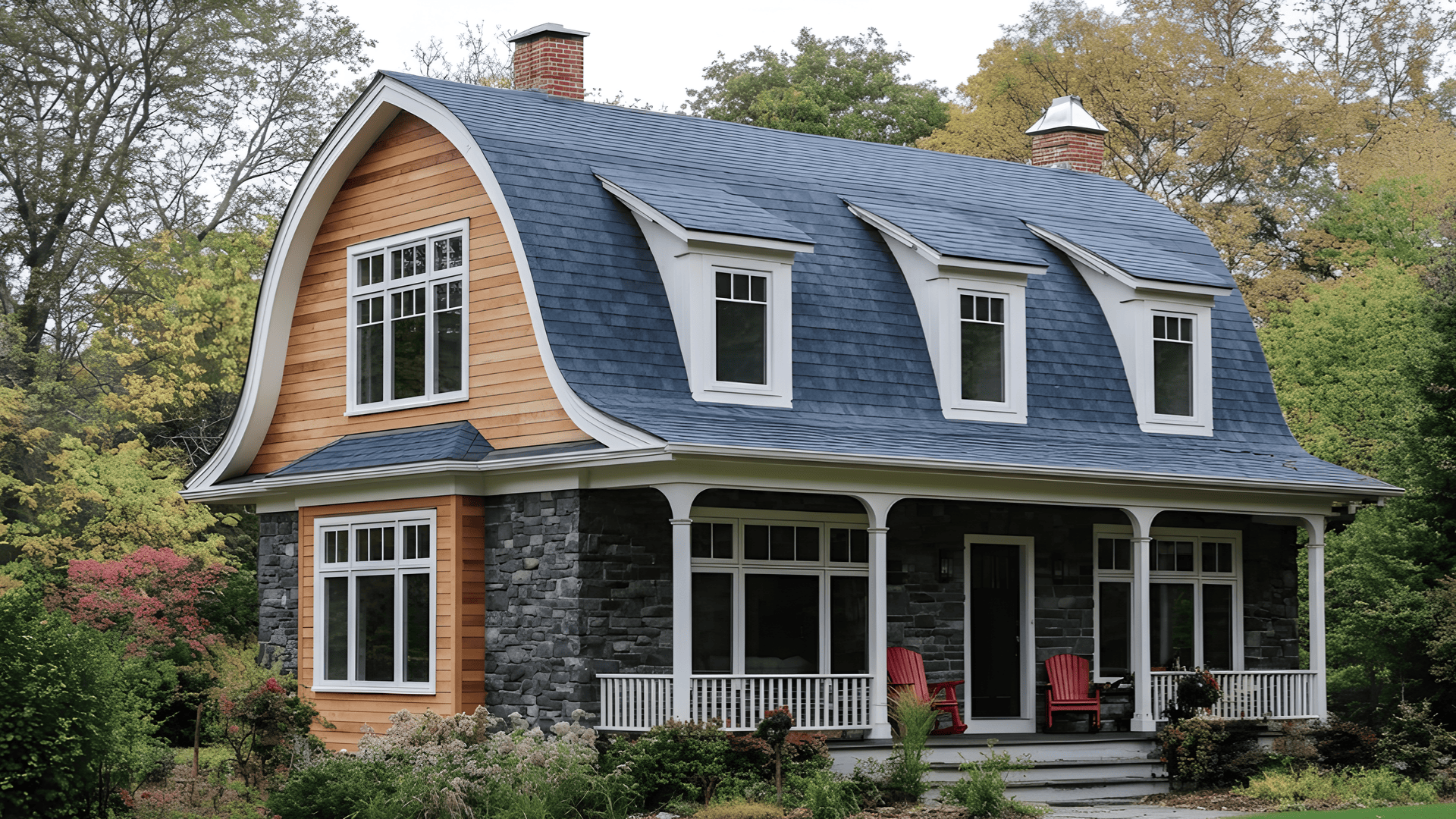 beautiful house with a gambrel roof type covered in blue shingles paired with red wooden siding