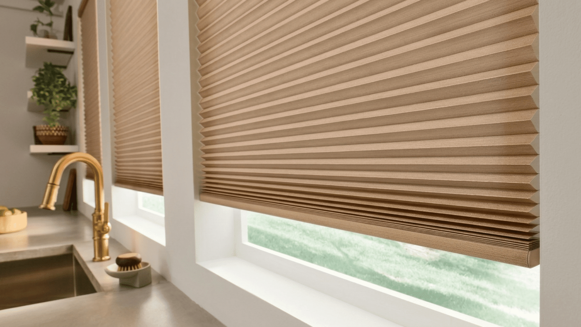 beige cellular shades on modern kitchen windows with soft light filtering and insulated honeycomb design