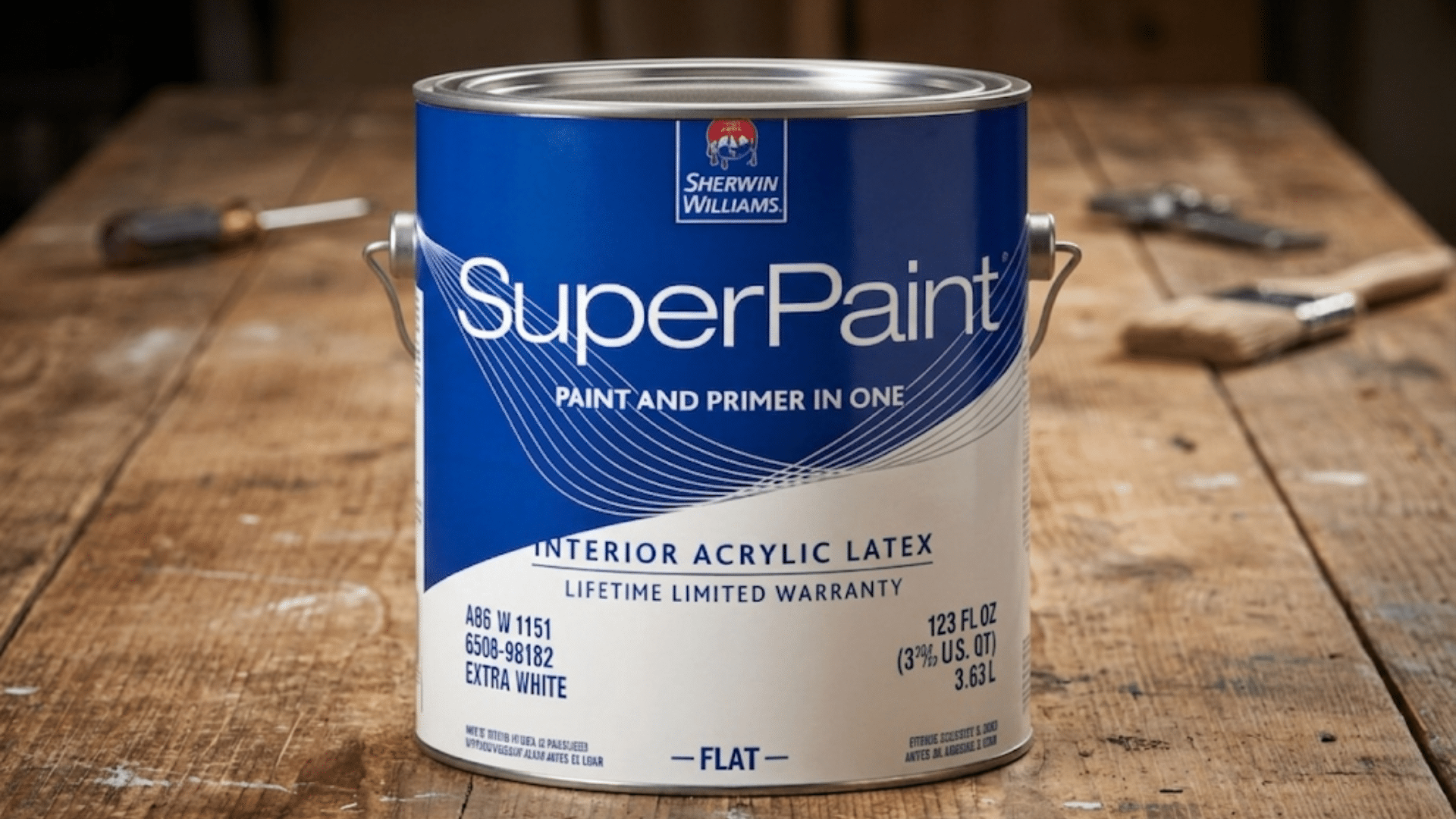 blue sherwin williams superpaint can on wooden table with tools in background showing valspar vs sherwin williams comparison