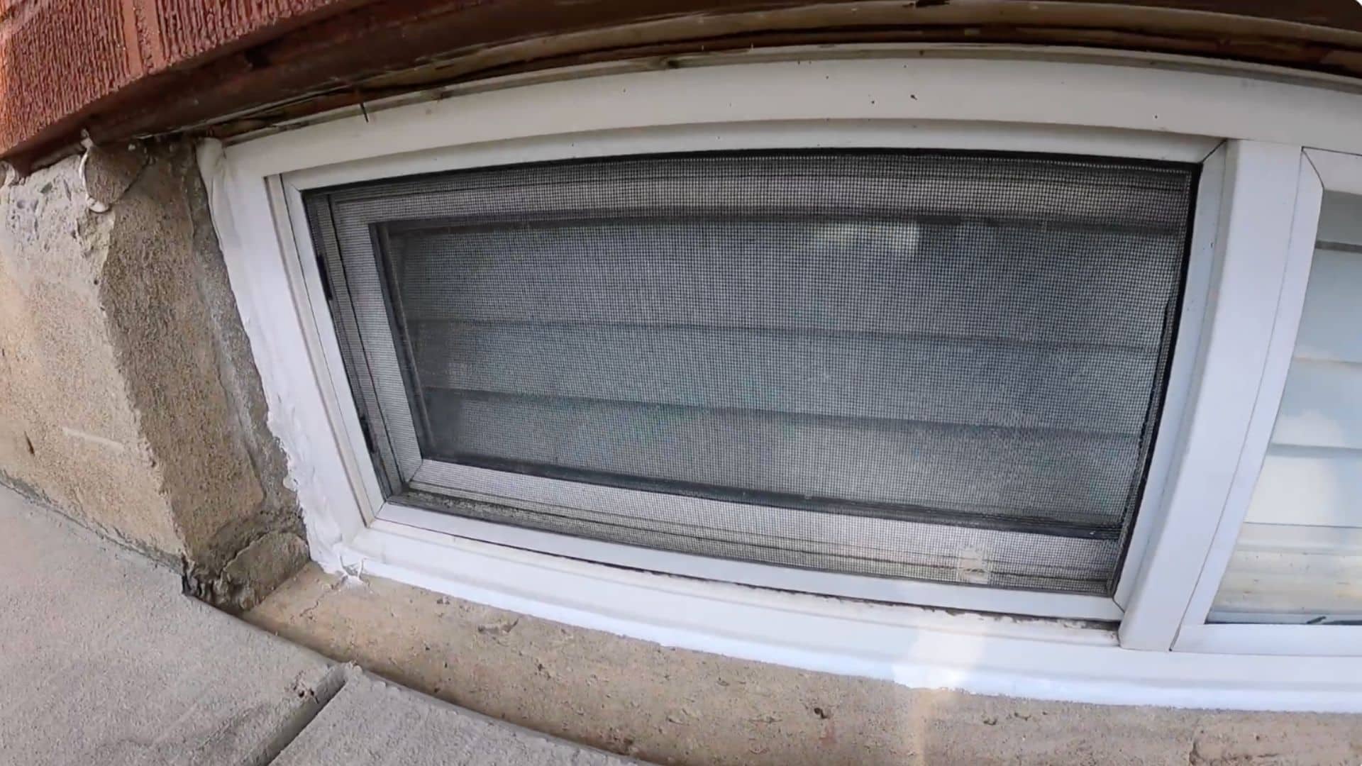 checking window edges and filling remaining gaps to ensure complete airtight and noise blocking seal
