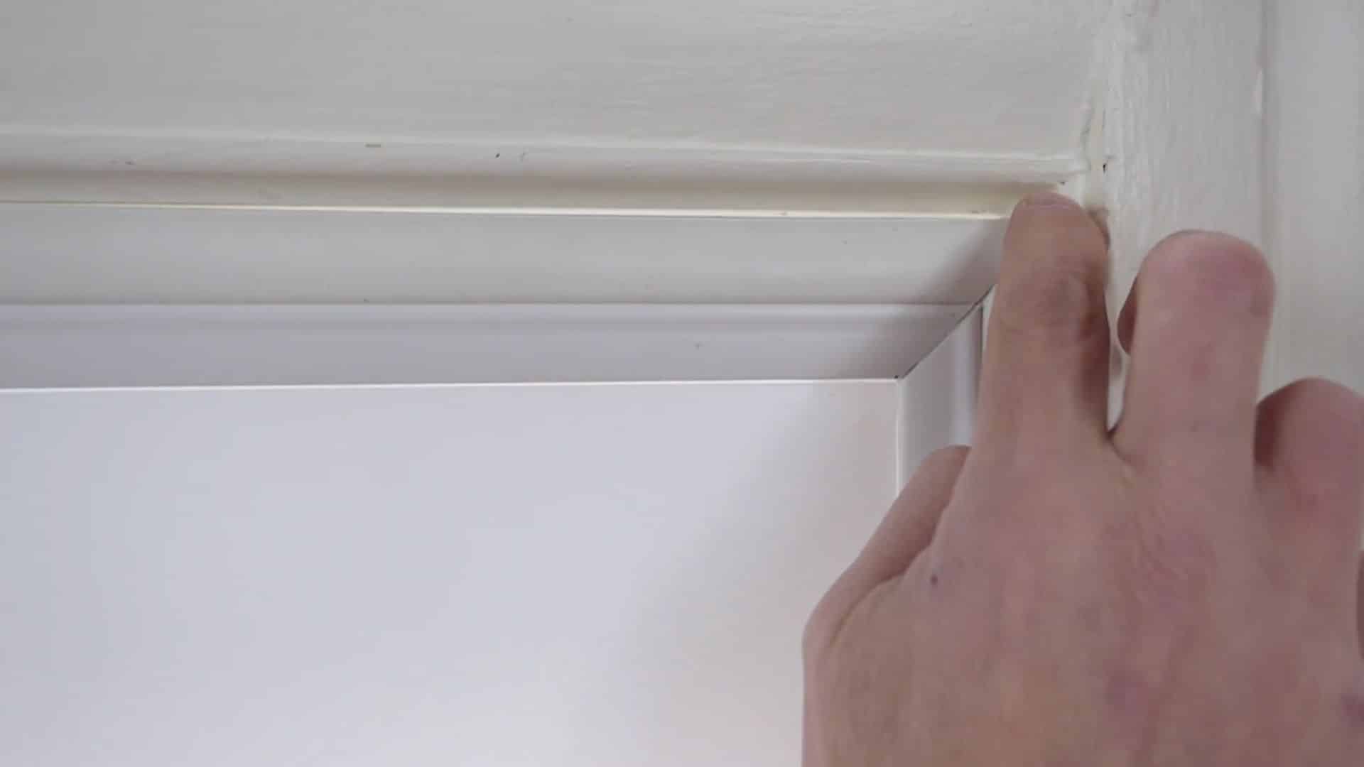 checking window insert seal and adjusting edges to remove gaps and maintain tight fit