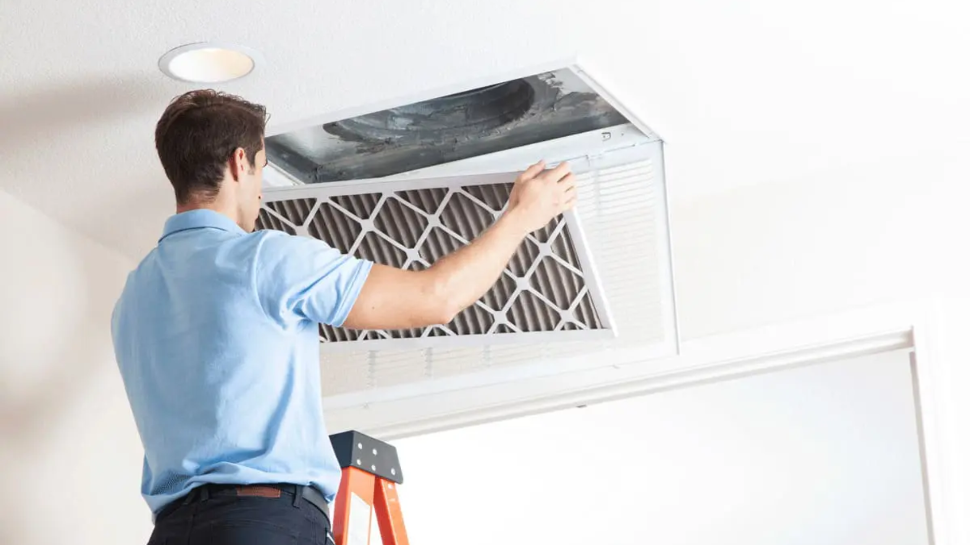 cleaning air vent filter during seasonal house cleaning routine