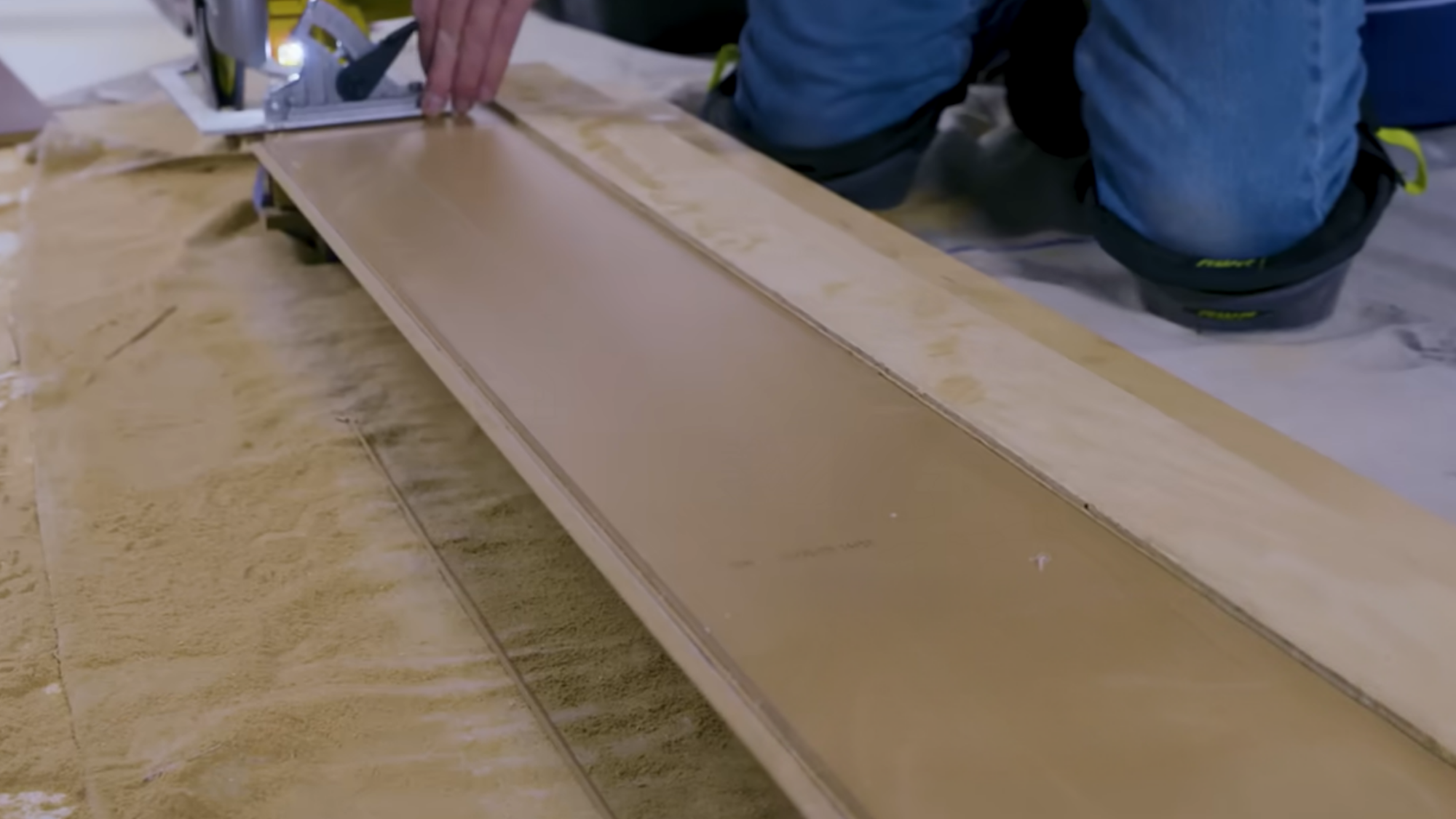 Cutting laminate planks to fit edges and corners during installation