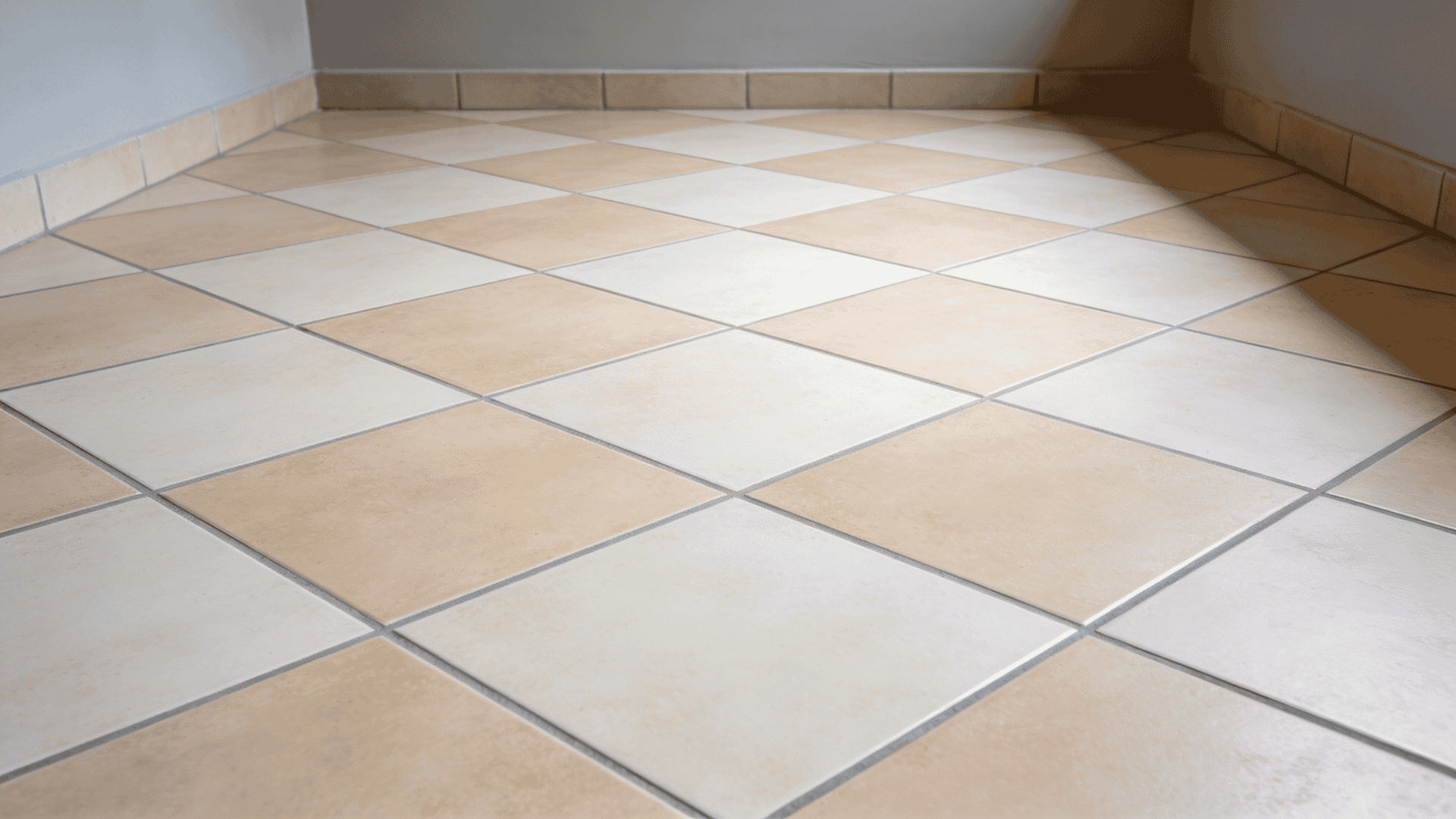 diagonal tile layout pattern with tiles set at angle creating wider feel and dynamic movement in space