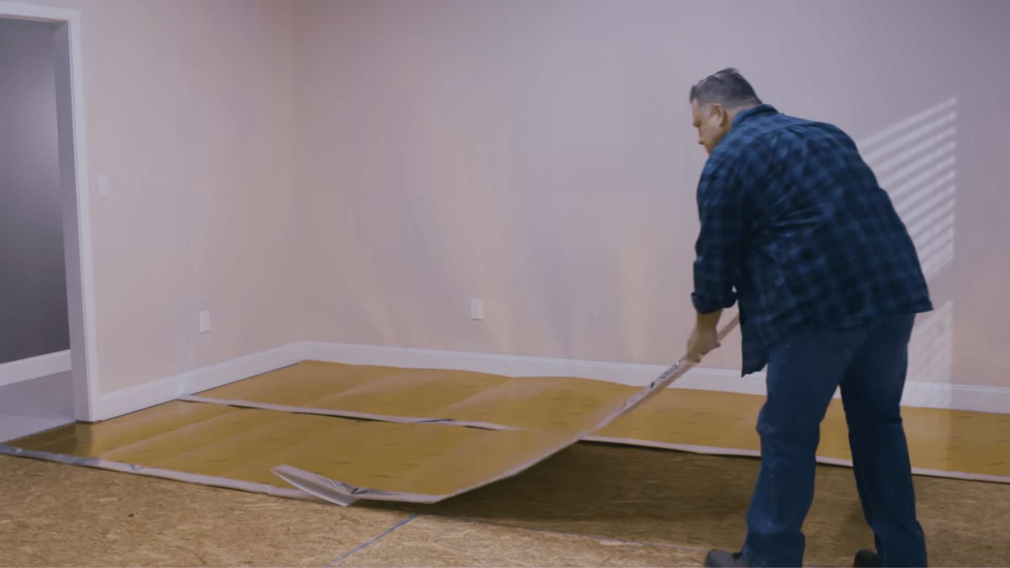Fitting laminate flooring around door frames and obstacles