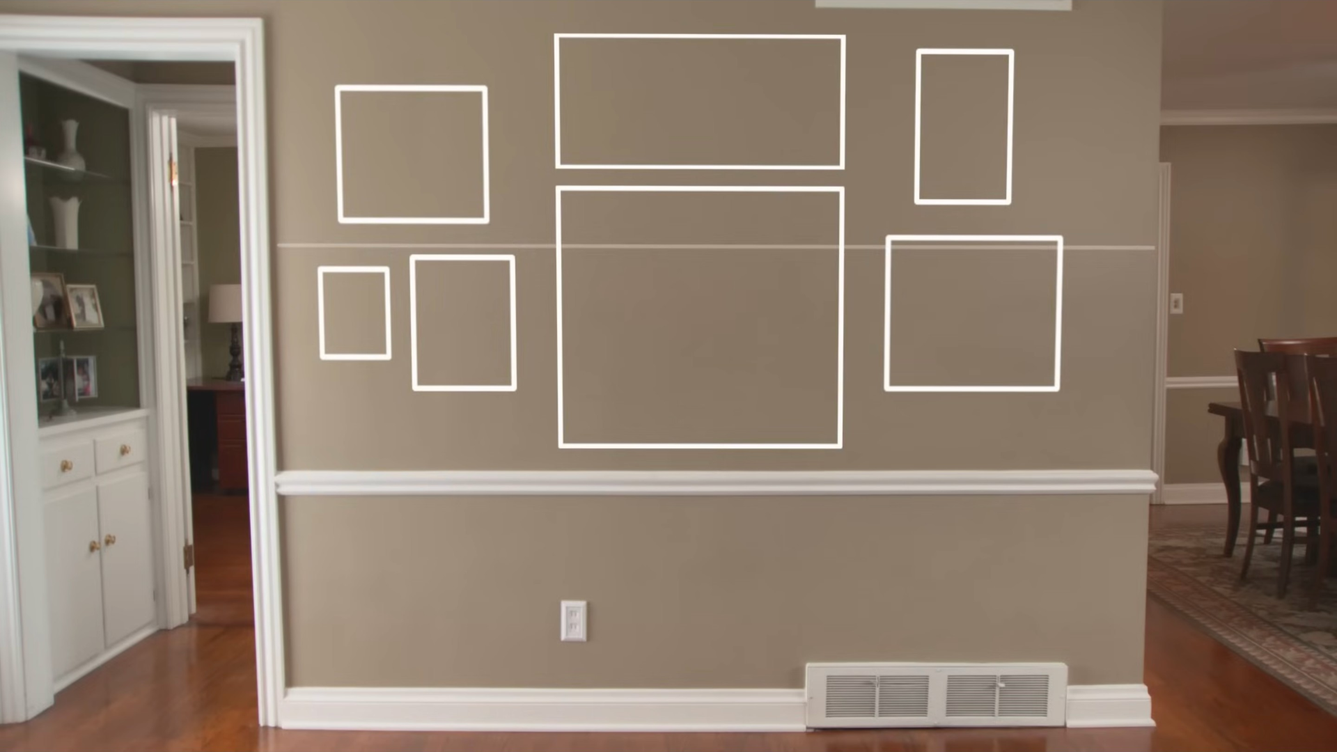 Gallery wall layout with balanced frame arrangement planning guide