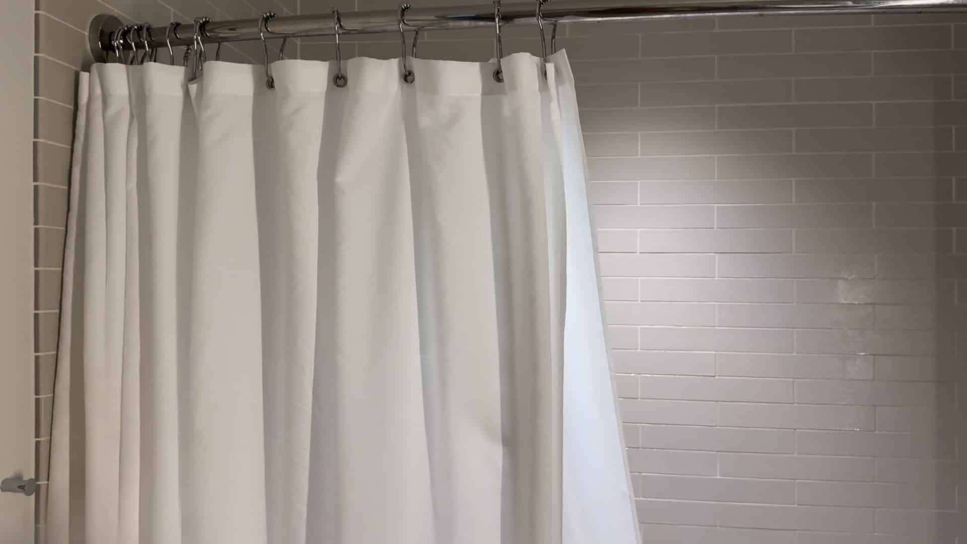 hang the shower curtain back on the rod or drying area and let it air dry completely to prevent mold and mildew buildup