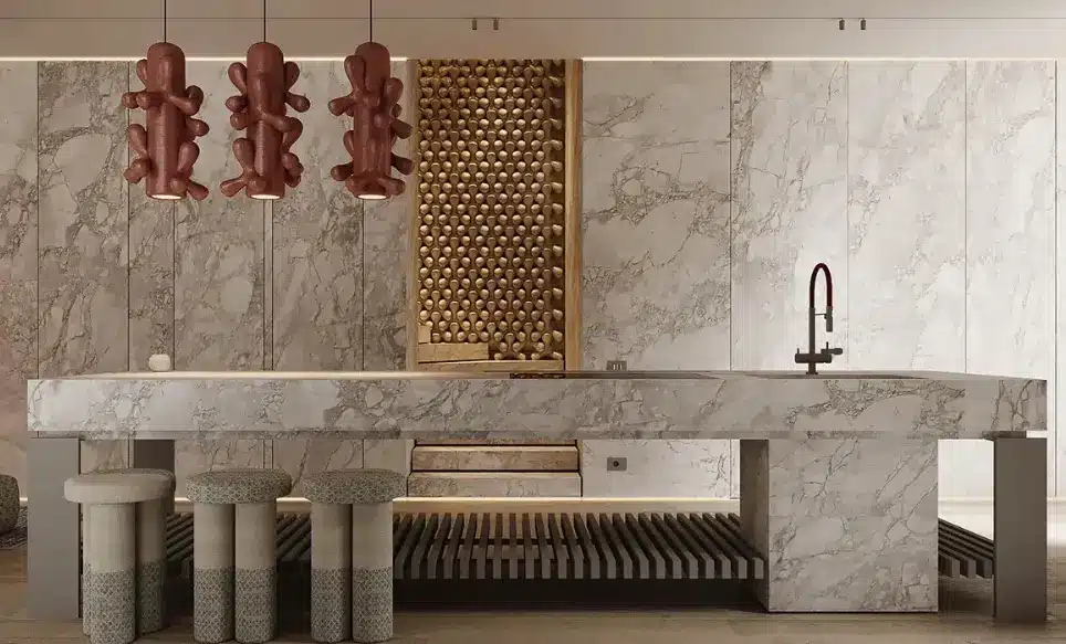 Marble kitchen island with unique red pendant lights and textured stools in modern interior