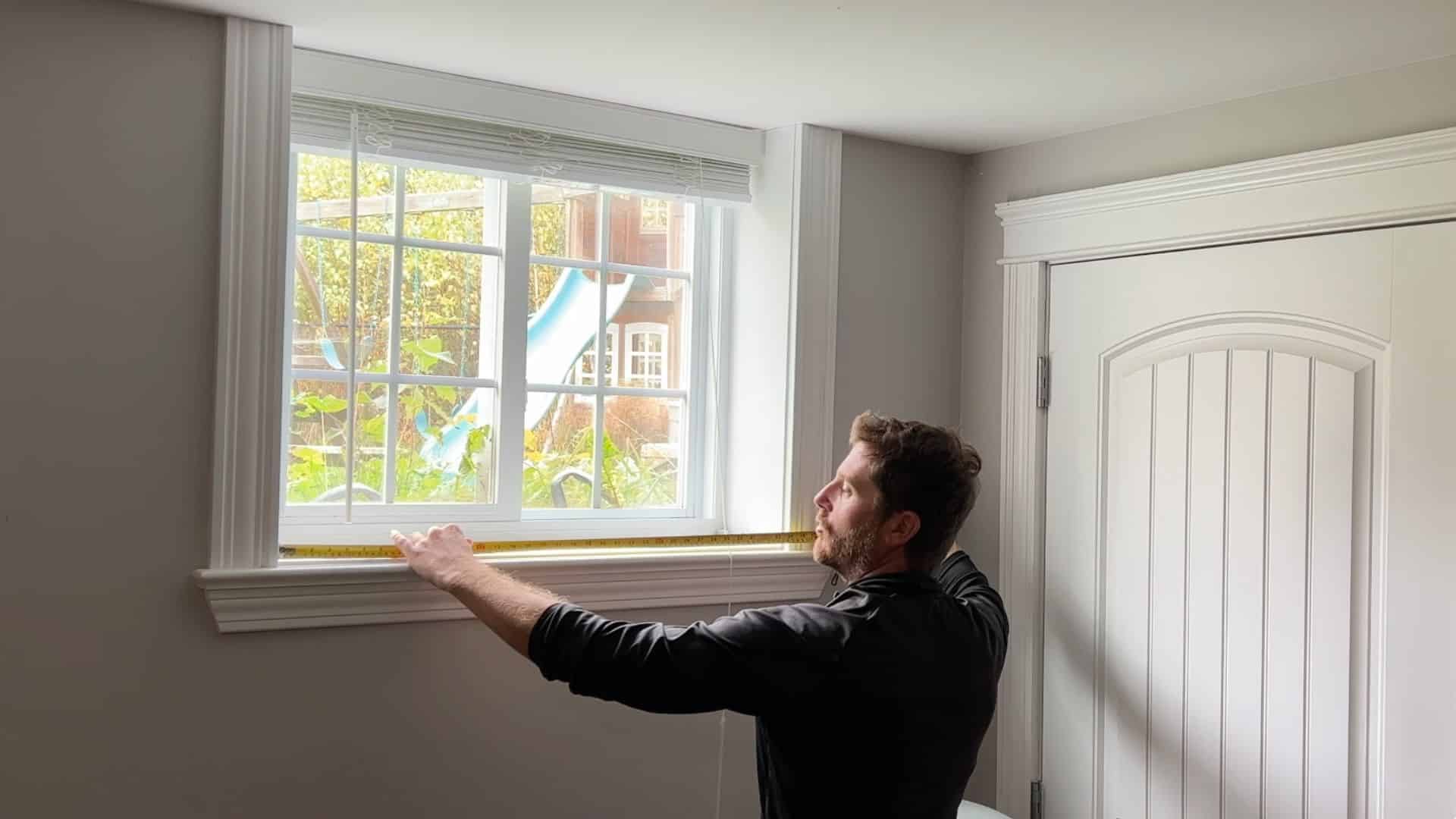 measuring window frame size and marking dimensions for accurate window plug fit