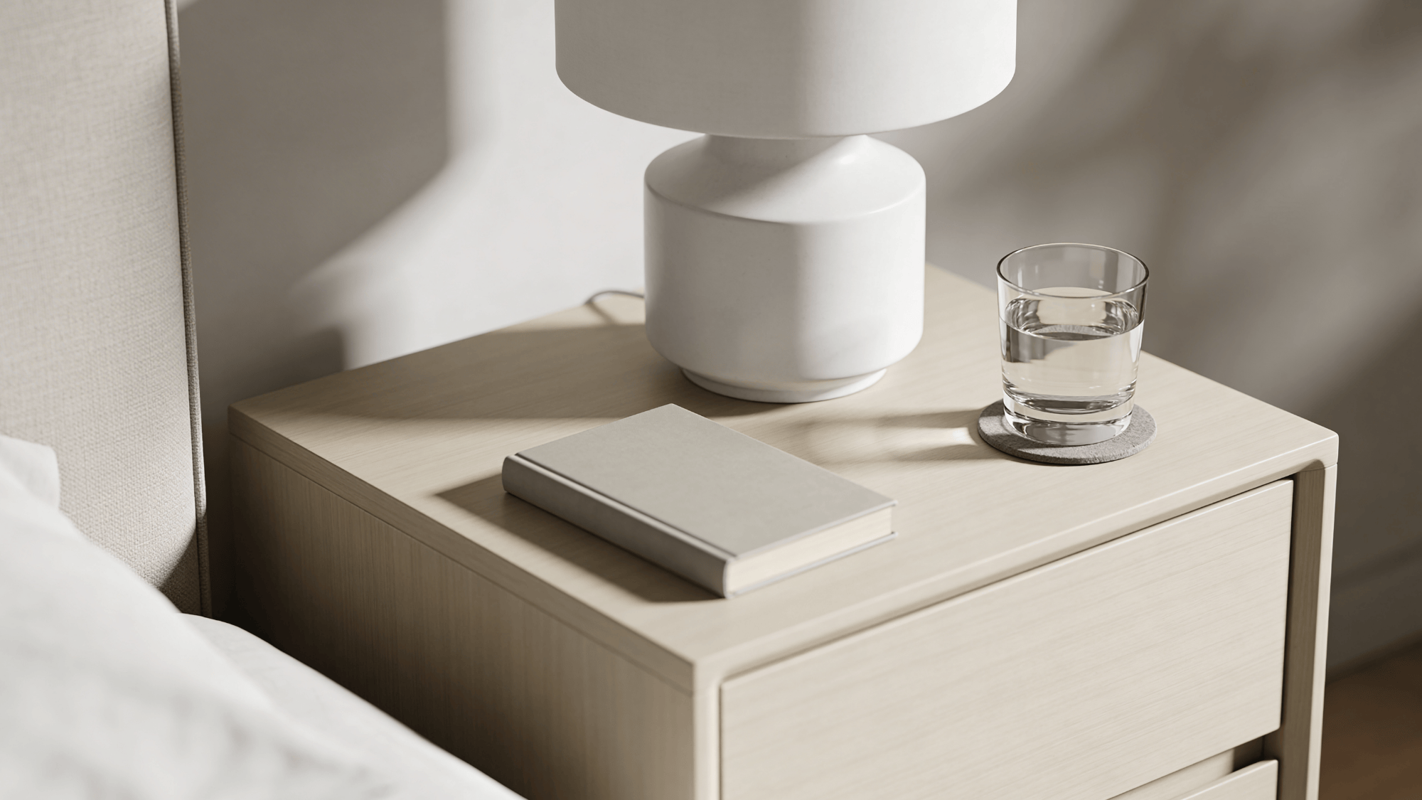 minimal nightstand setup with lamp book and glass for clean bedroom organization ideas