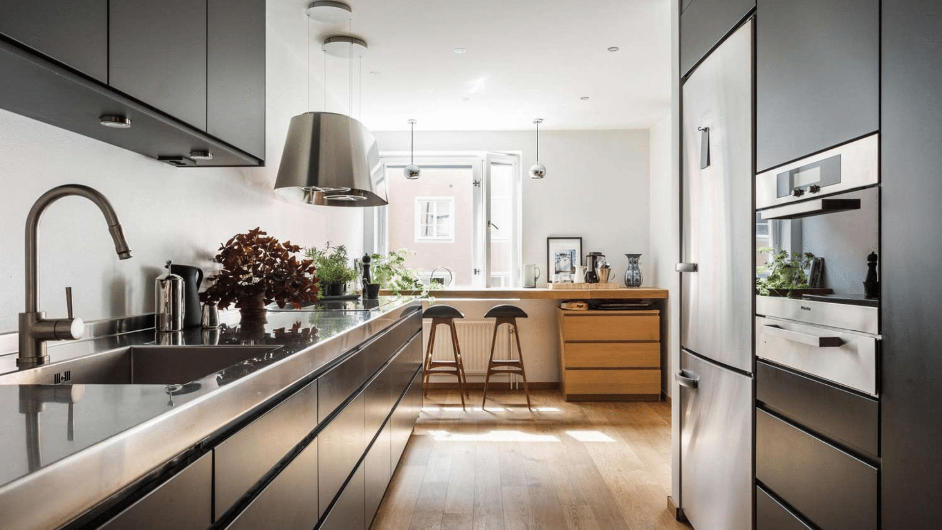 modern narrow dark galley kitchen designs with breakfast bar seating