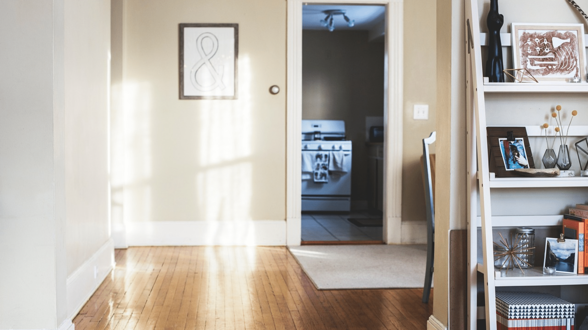 gallery wall with framed artwork and photos arranged neatly to add style and personality to the room