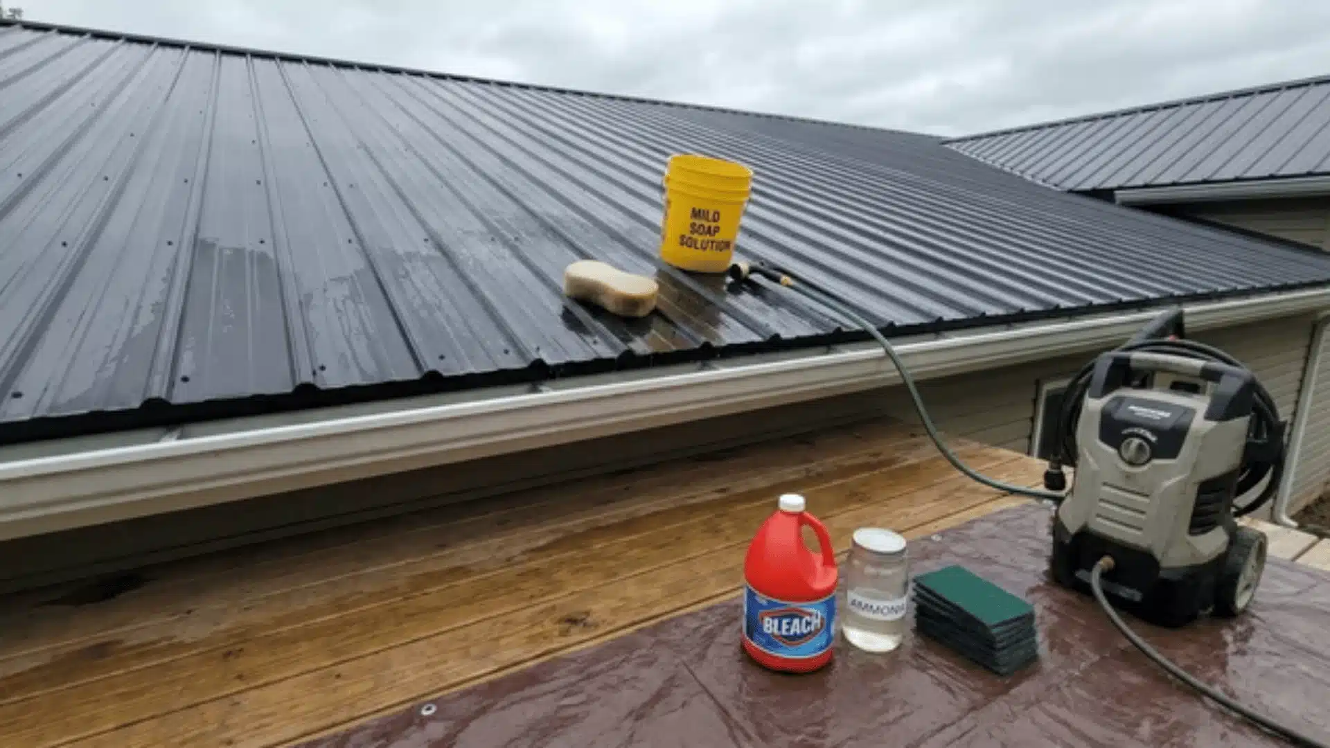 Roof cleaning setup with mild soap and soft tools in use and bleach, ammonia, abrasive pads, and pressure washer set aside