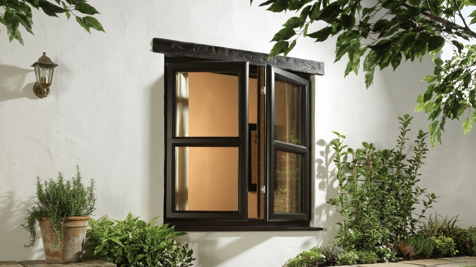 black framed open window on a white wall surrounded by leafy garden plants