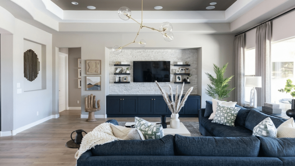 Family Room vs Living Room: Design and Purpose bright living room with modern sofa stylish coffee table decorative accents and large windows creating an inviting gathering space