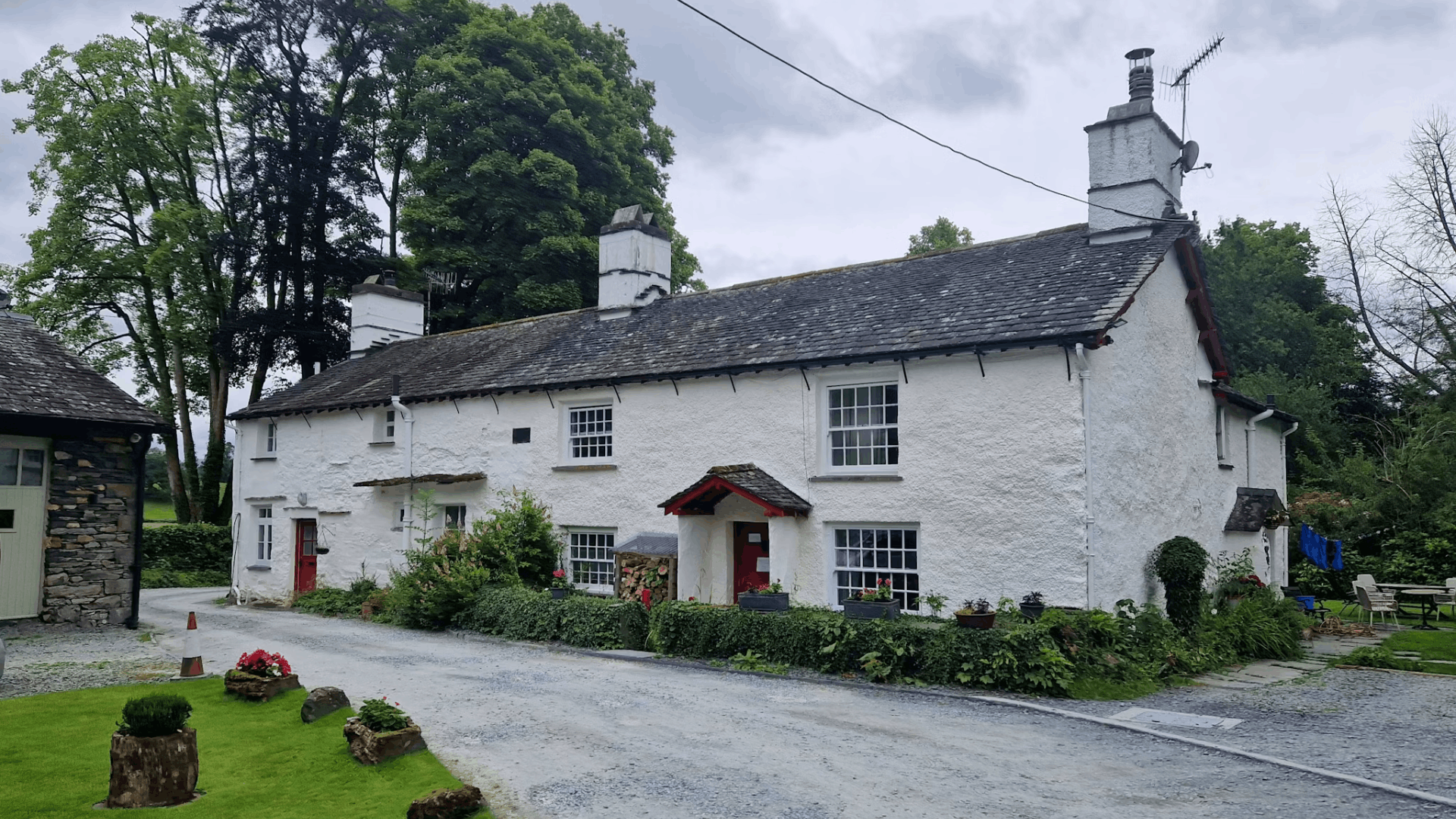 charming cottage house with simple architecture inviting entrance and small footprint designed for budget friendly living