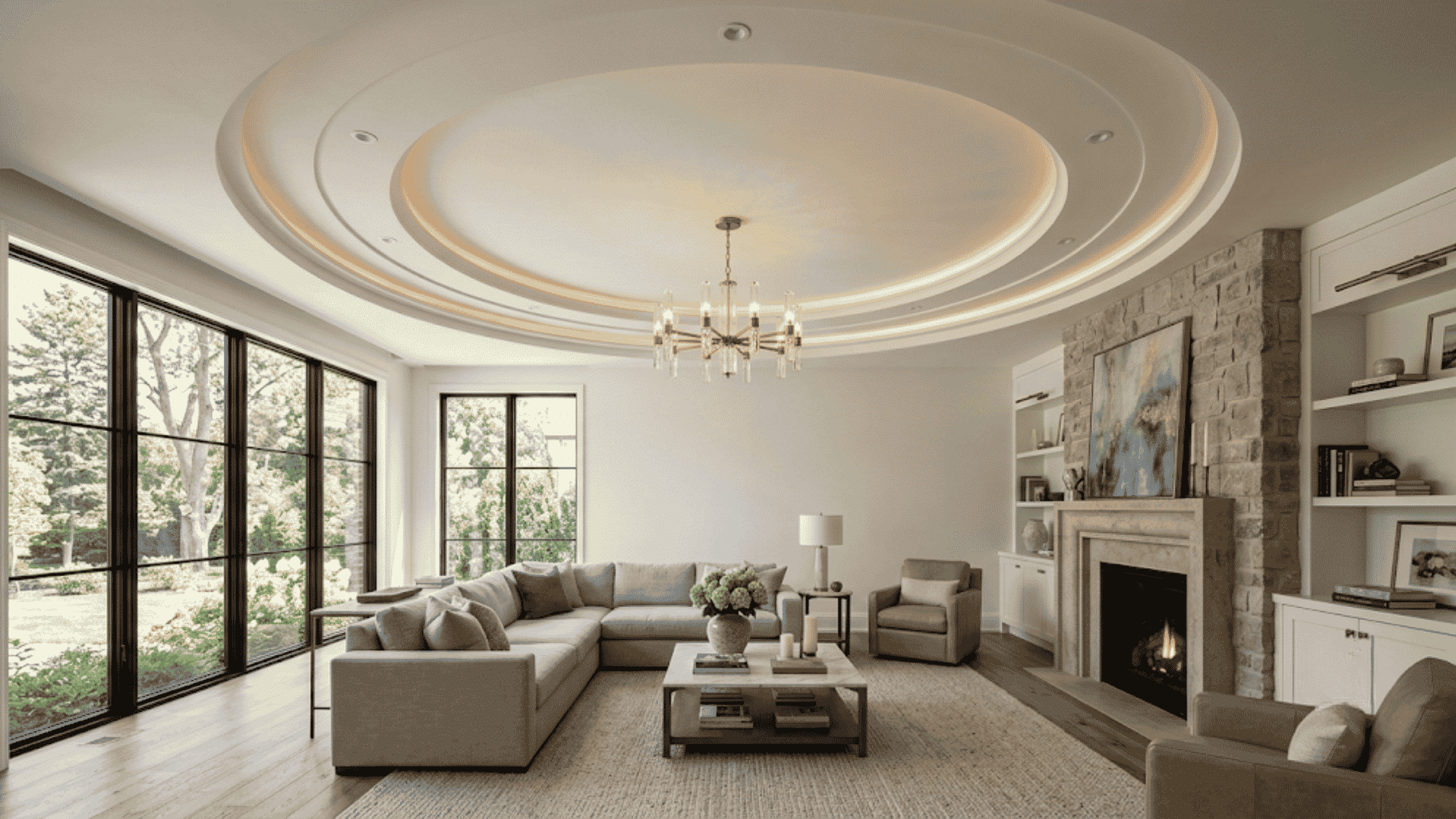 curved tray ceiling with layered circular design and soft cove lighting creating a bright elegant modern living room