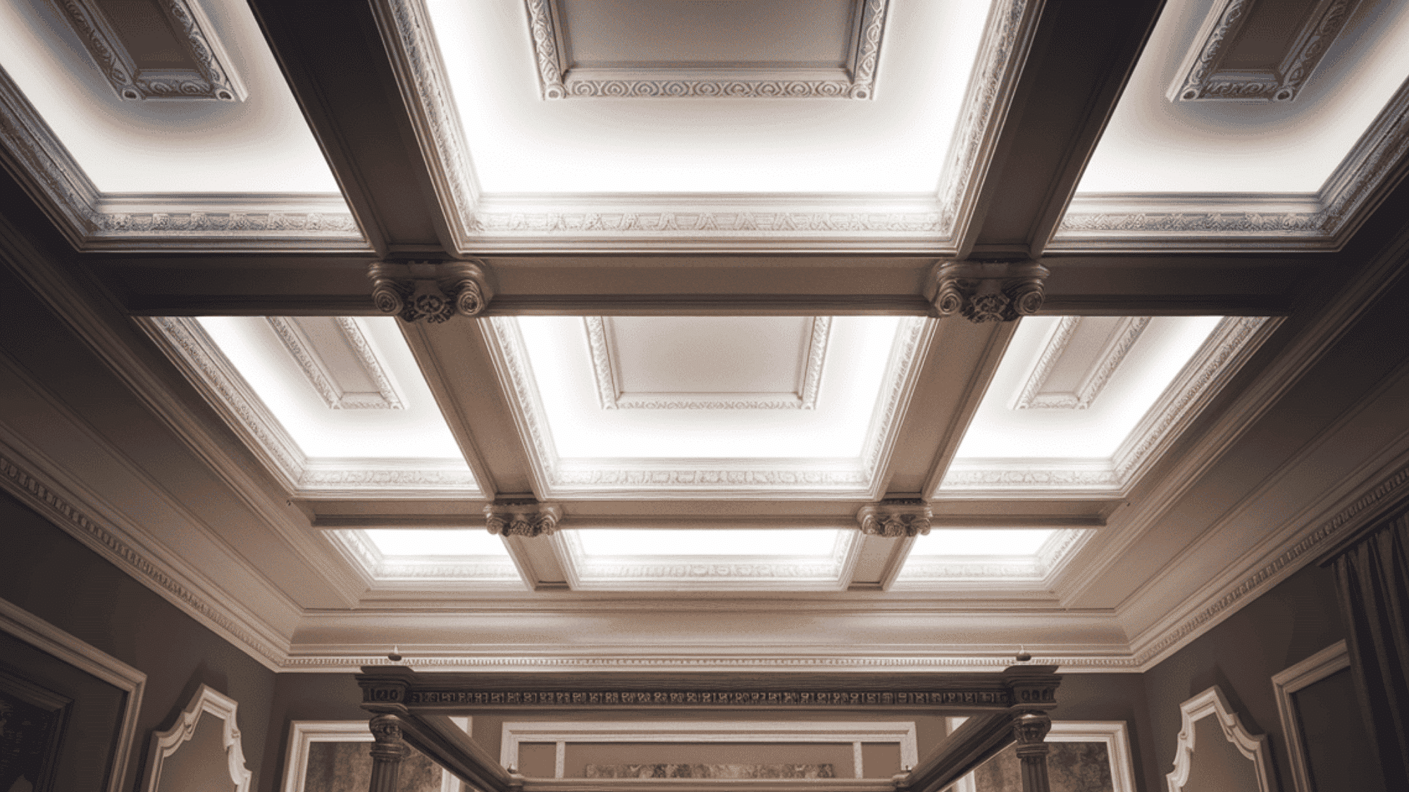 luxury hotel inspired ceiling with elegant coffered panels ornate molding and soft recessed ambient lighting