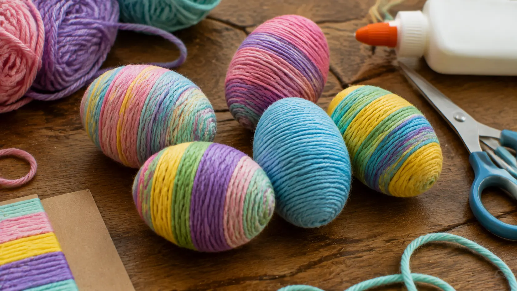 Yarn-wrapped Easter eggs with textured layers